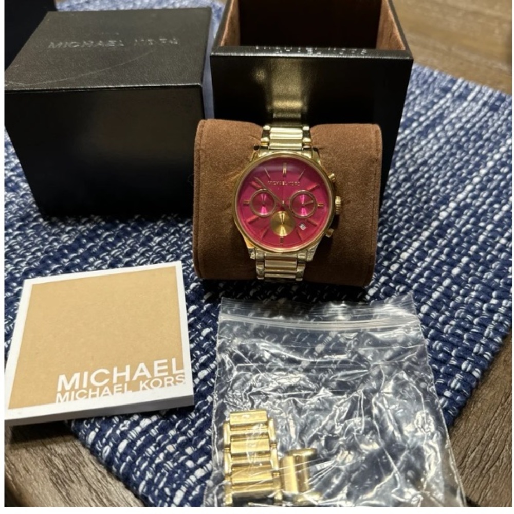 Michael Kors gold watch with pink face